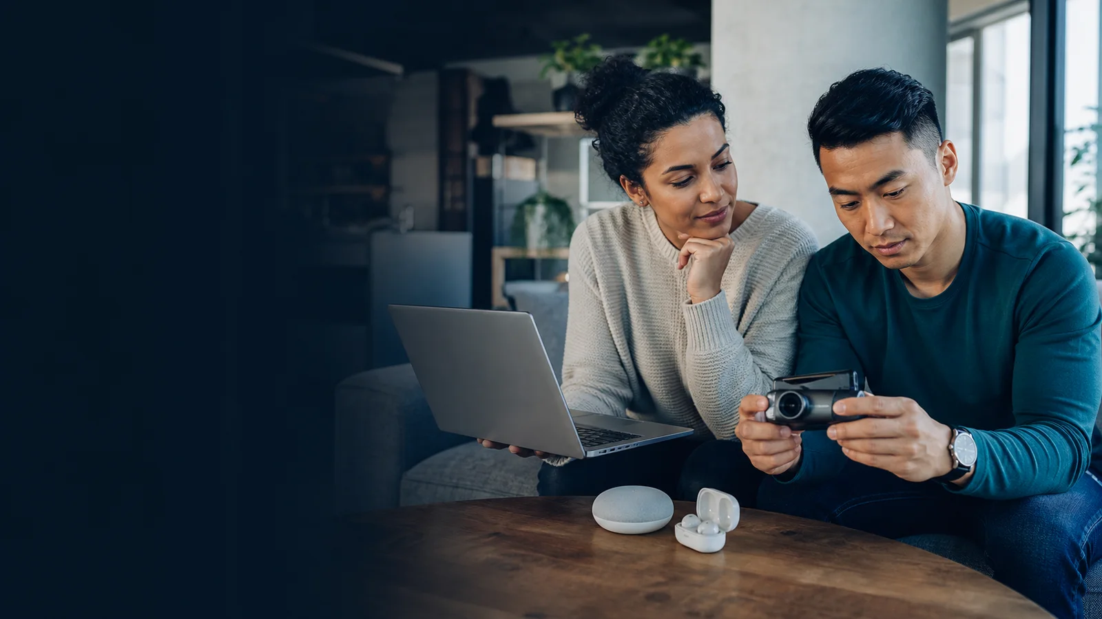 A couple comparing everyday technology at home